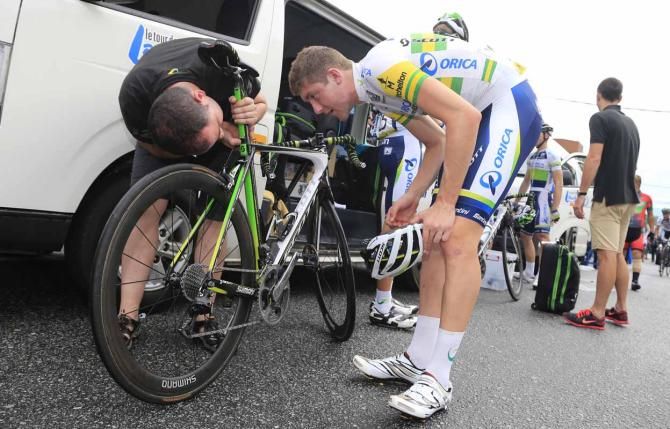 Luke Durbridge checks his bike