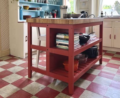 A red IKEA kitchen island