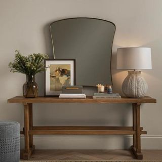 A McGee & Co. mirror on an entryway console table