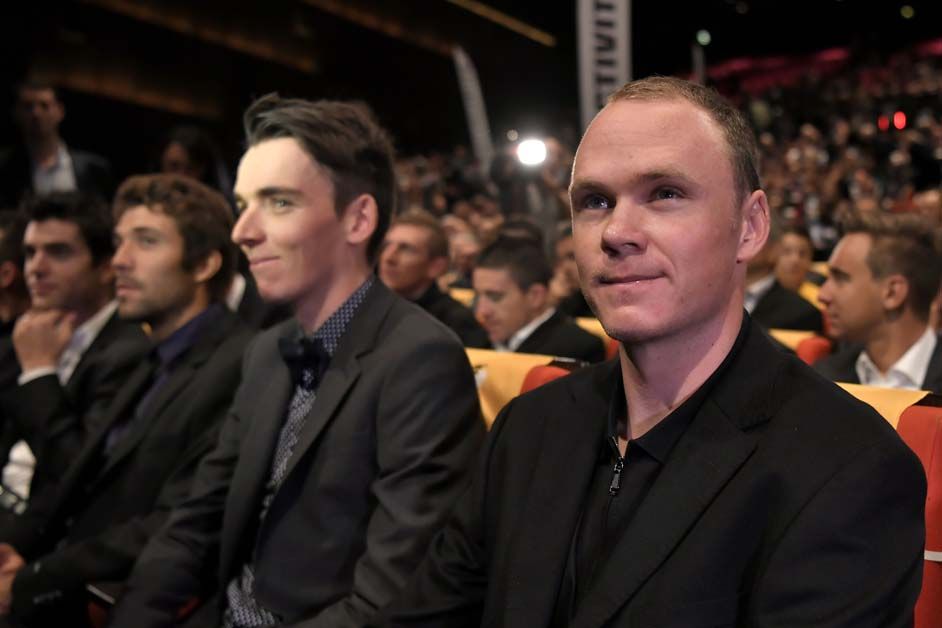 Chris Froome and Romain Bardet sit next to each other