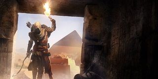 An assassin enters a pyramid in Assassin's Creed Origins.