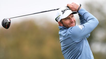 Dean Burmester hits a drive at the Farmers Insurance Open