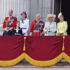 Prince William, Kate Middleton, Prince Louis, Princess Charlotte, King Charles, Queen Camilla, Duchess Sophie standing on the Buckingham Palace balcony in dresses and military uniforms during Trooping the Colour 2024