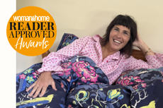 Sara Darling shown testing bedding next to an orange roundel for W&H readers awards