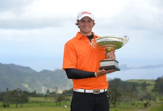 Peter Uihlein holds the Madeira Islands Open trophy in 2013