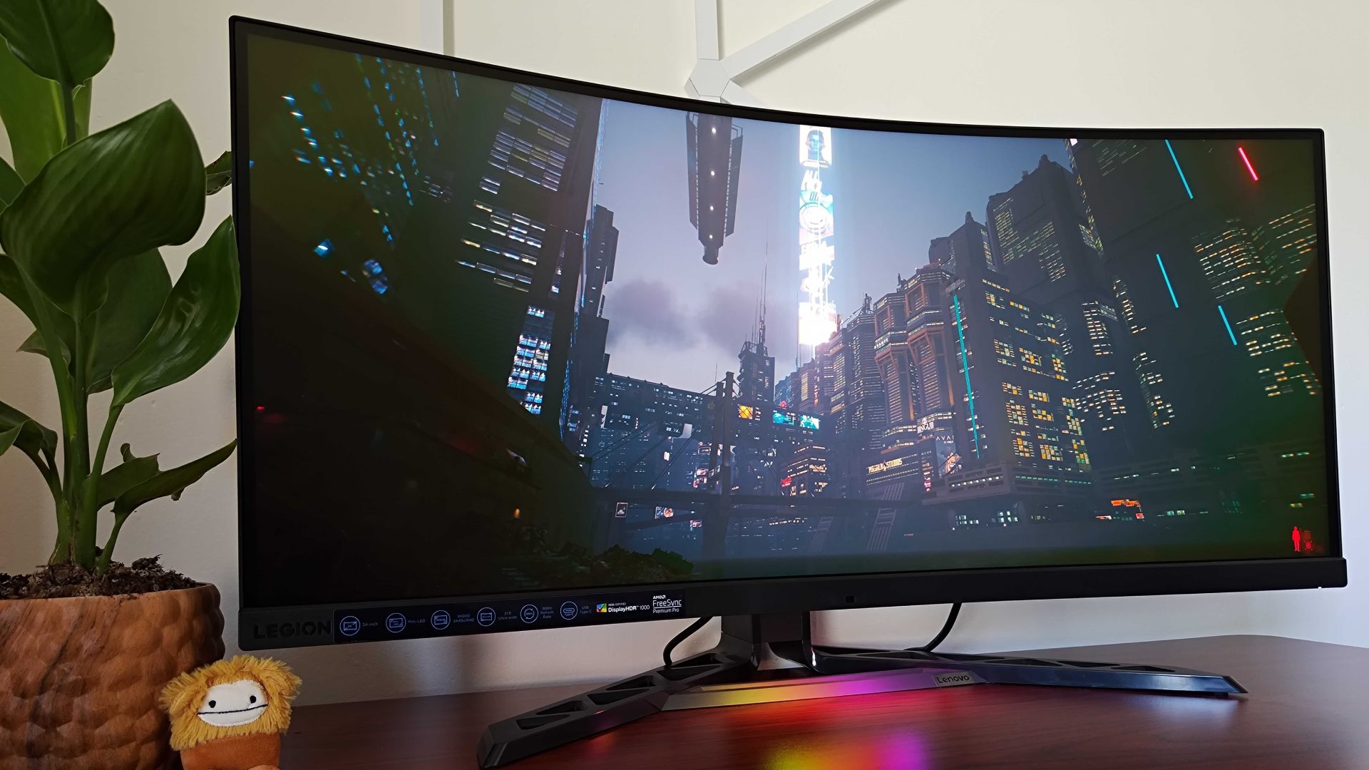 Lenovo Legion Y34wz-30 with Cyberpunk 2077 gameplay and view on Night City in the distance