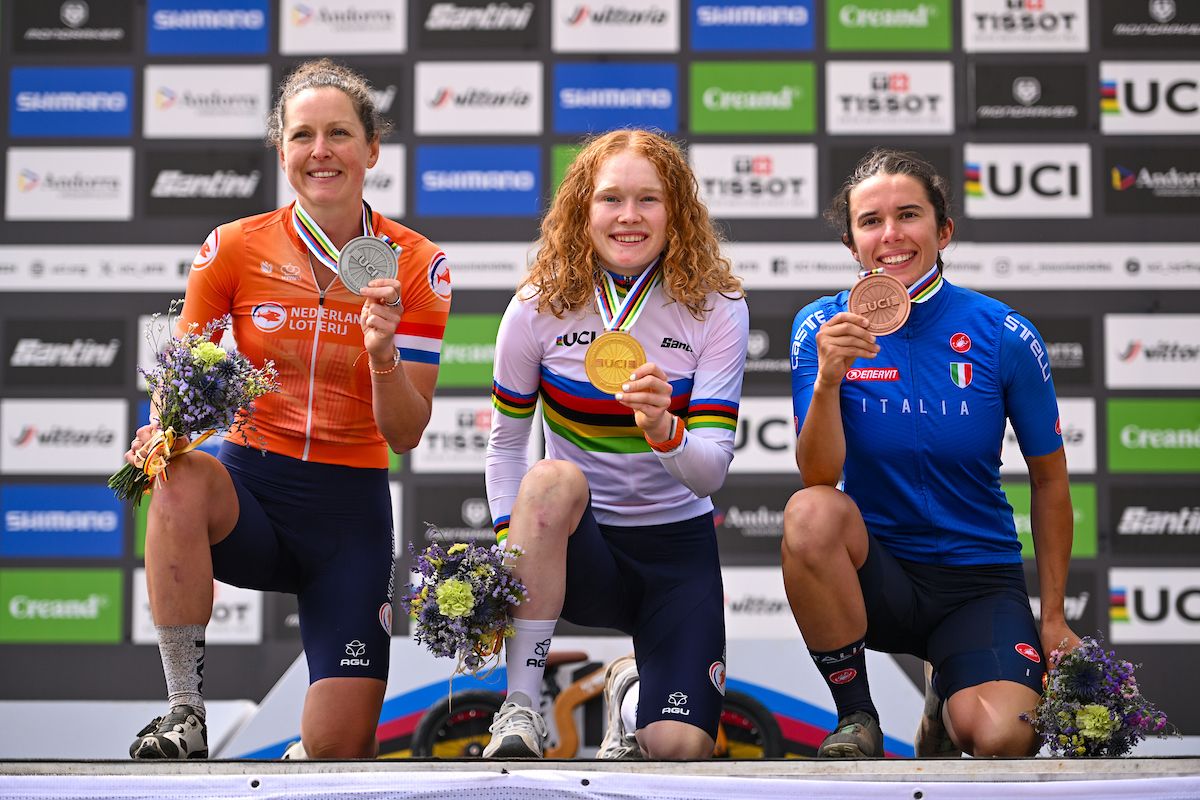 Picture by Will Palmer/SWpix.com - 01/09/2024 - Cycling - 2024 UCI Mountain Bike World Championships - Pal Arinsal, Arinsal, Andorra - Women Elite Cross-country Olympic Final Podium - Puck Pieterse (Netherlands) receiving the Gold medal with Anne Terpstra (Netherlands) receiving the Silver Medal and Martina Berta (Italy) receiving the Bronze Medal