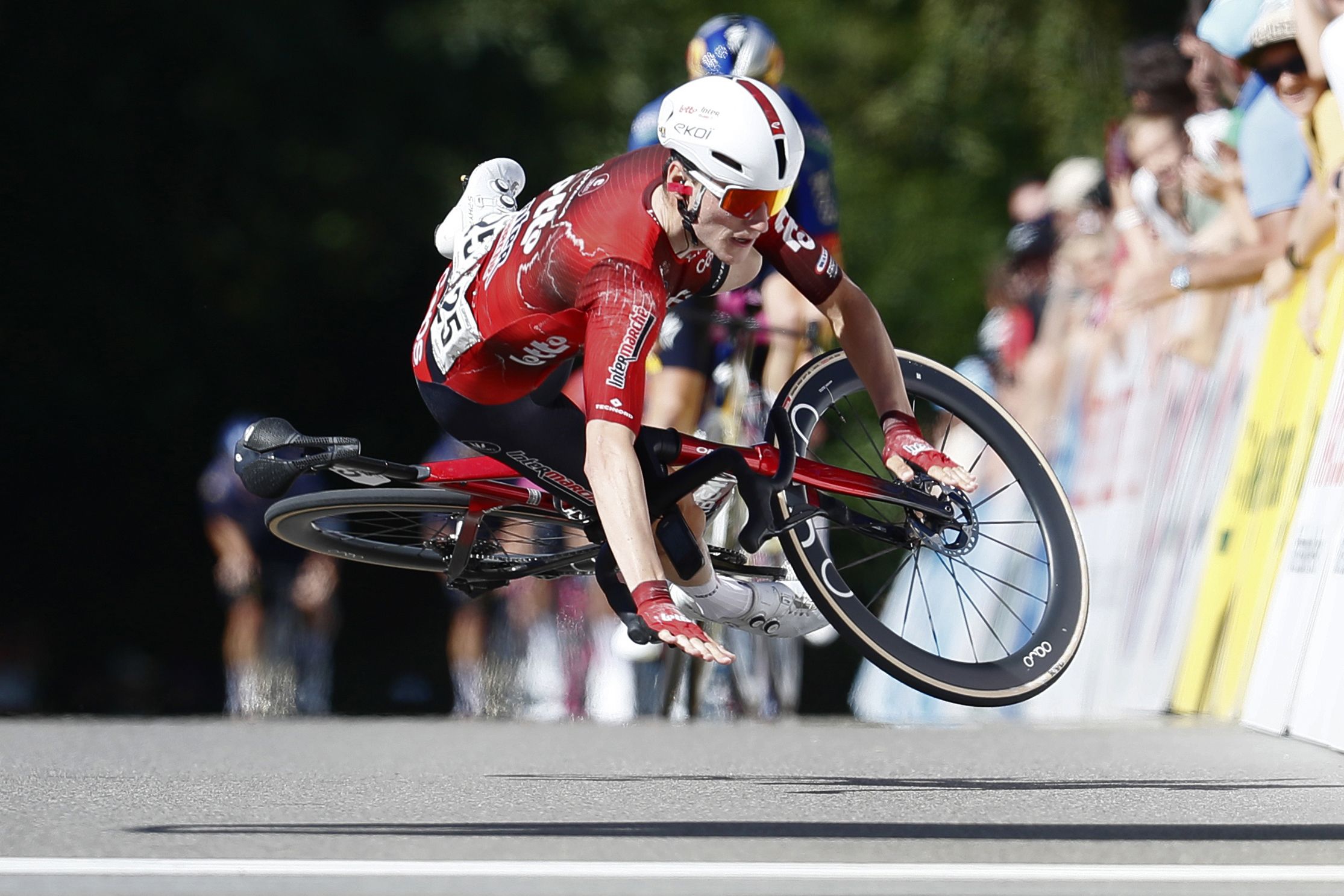 'It feels a bit silly but I’m just incredibly happy' – Belgian rider crashes over finish line and still wins