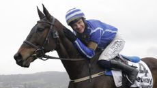 Energumene with Paul Townend riding celebrate after their win in the Champion Chase during racing on day two of the Cheltenham National Hunt jump racing festival at Cheltenham Racecourse on March 15th 2023 in Gloucestershire, England (Photo by Tom Jenkins/Getty Images)