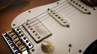 Electric guitar with a HSS pickup configuration