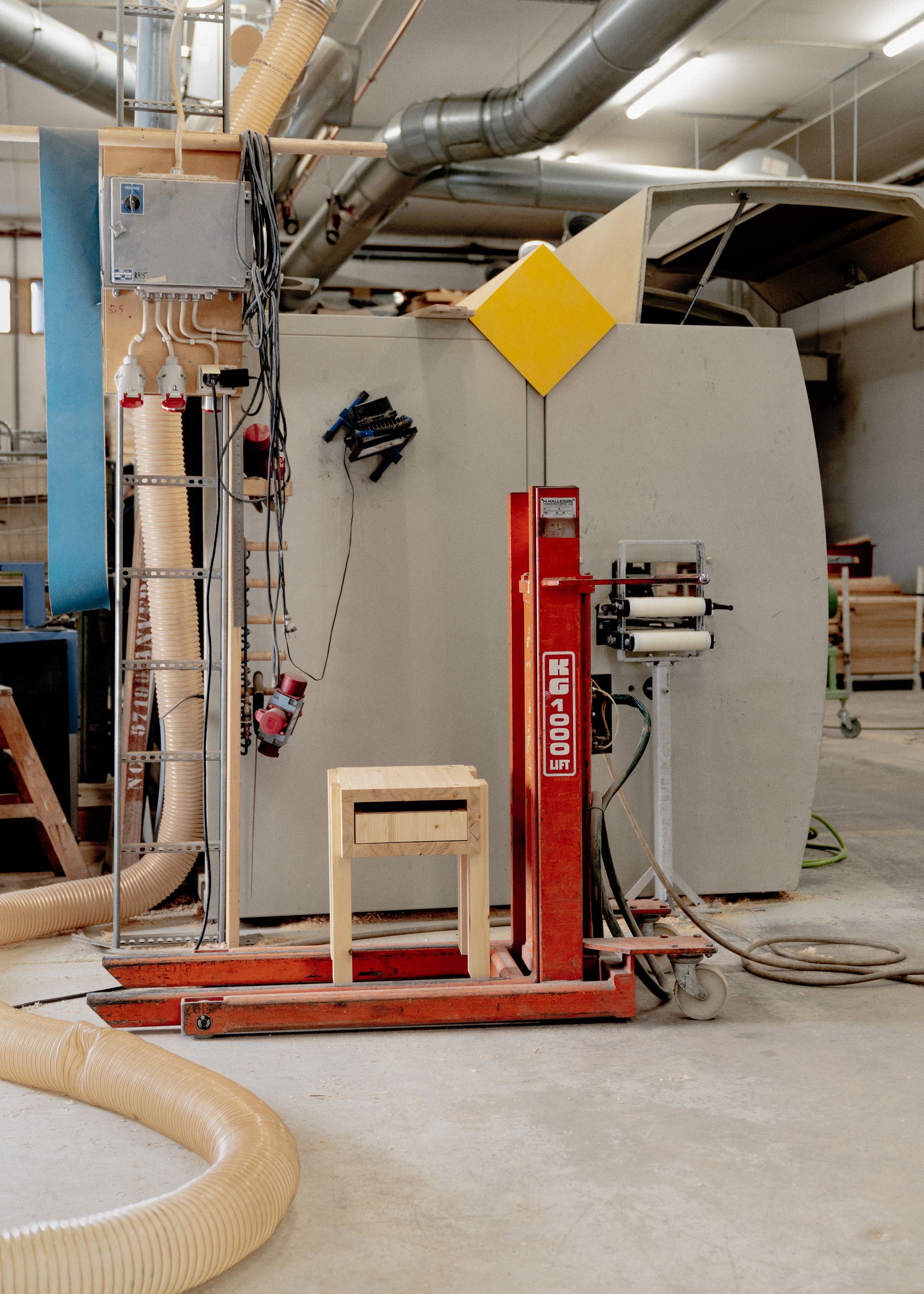 small side table made of pine wood on a forklift