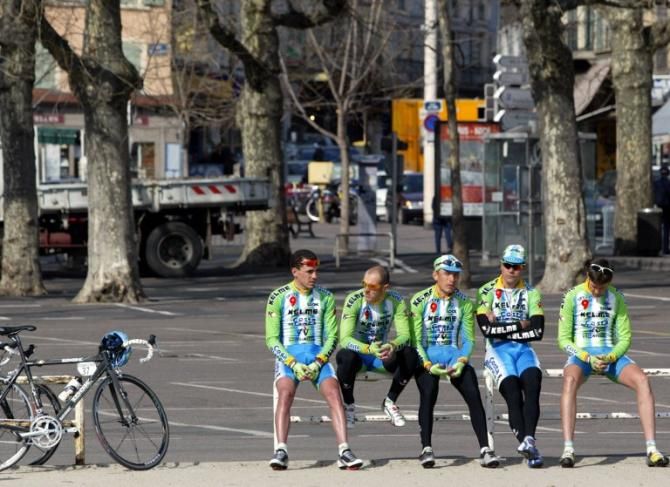 The 2003 Kelme team await a stage start after the death of Cofidis rider Andrei Kivilev
