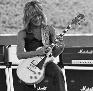 Randy Rhoads performs onstage with Ozzy Osbourne at the Oakland Coliseum in Oakland, California on July 4, 1981