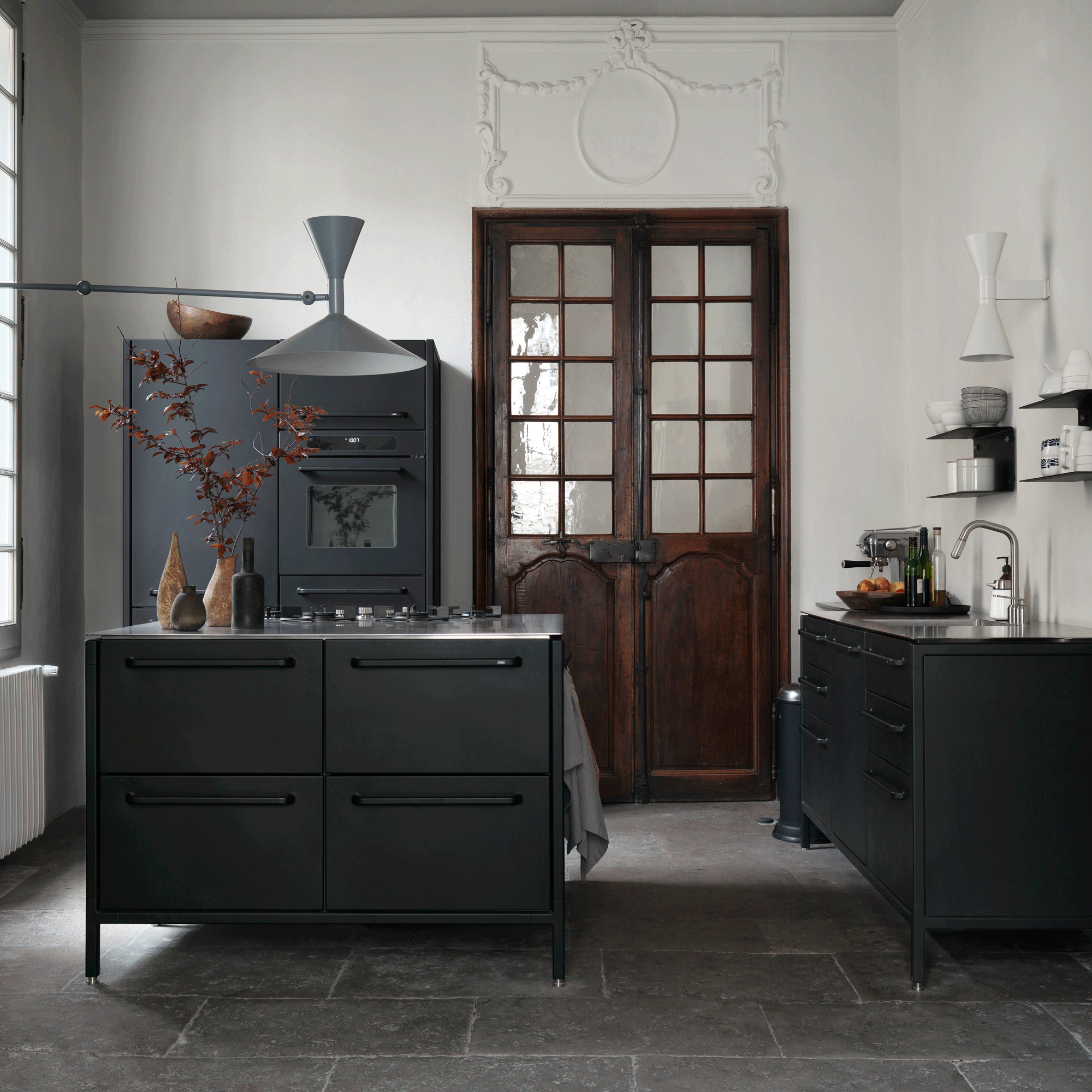 black freestanding kitchen with large task llight