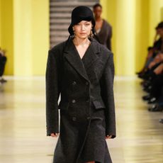 An image of Miu Miu showcasing the winter coat colour trend.