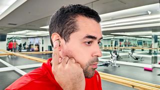 Jabra Elite 8 Active Gen-2 worn by reviewer Alex Bracetti testing touch controls