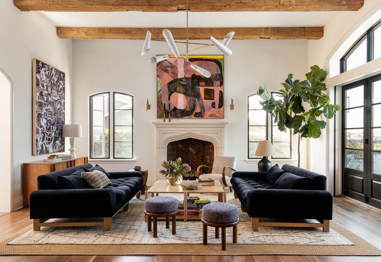 A living room with large deep sofas