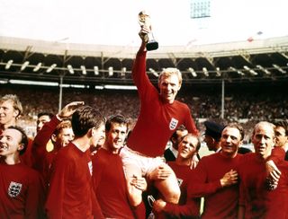 England captain Bobby Moore lifts the Jules Rimet trophy after England defeated West Germany 4-2 at Wembley Stadium, London to win the 1966 World Cup.