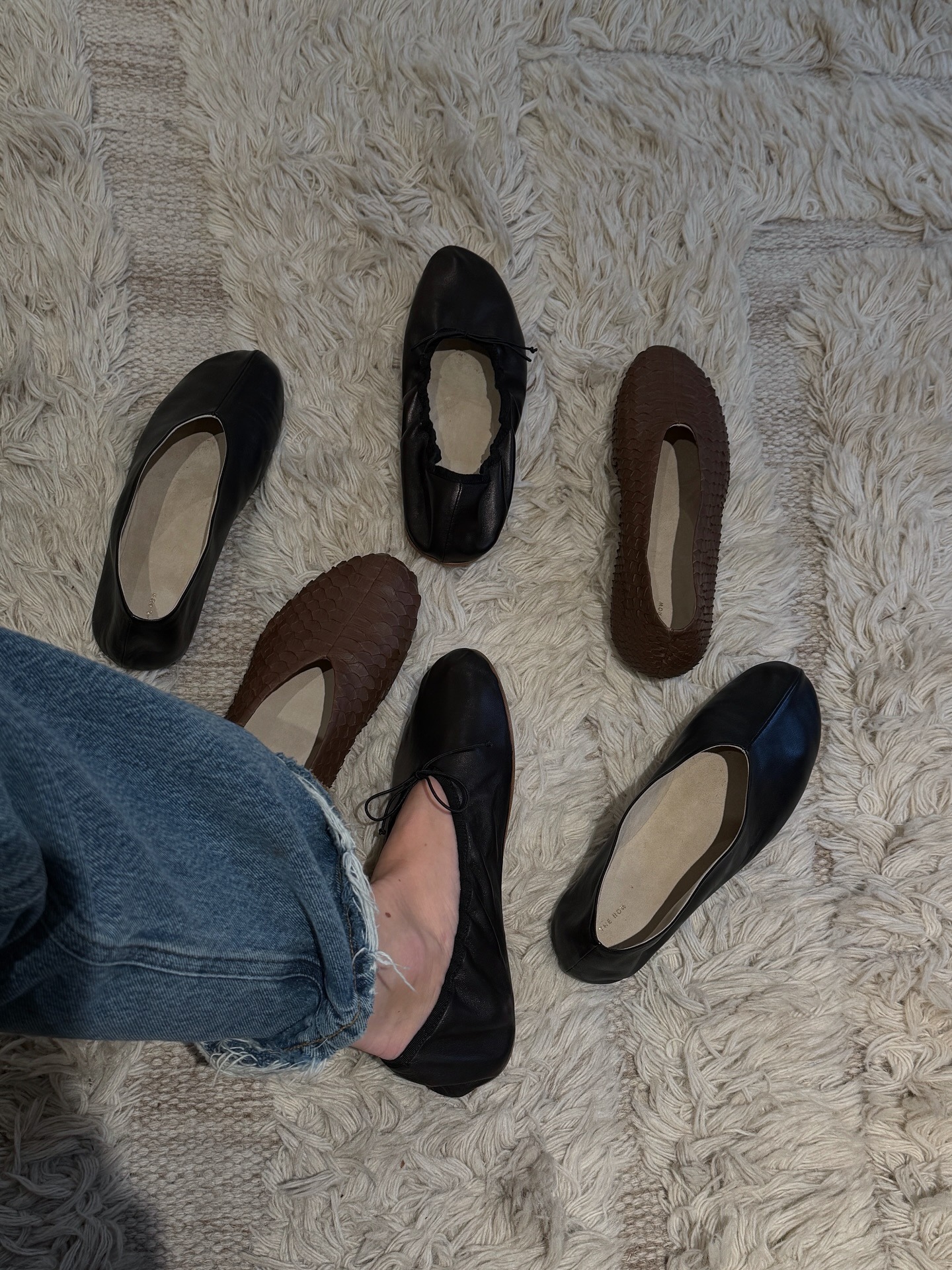 Influencer wearing The Row glove flats