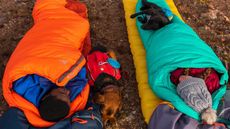 best camping mat: a man and a woman zipped into their individual Kelty Galactic Air Inflatable Sleeping Pads