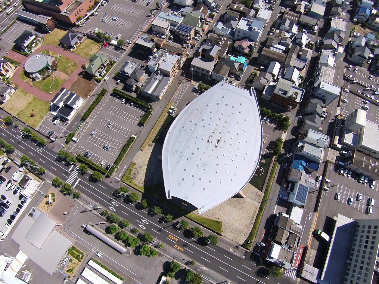 Kagawa Prefectural Gymnasium, Kenzo Tange's 'ship gymnasium' in Japan, a curved concrete structure currently under threat of demolition due to neglect