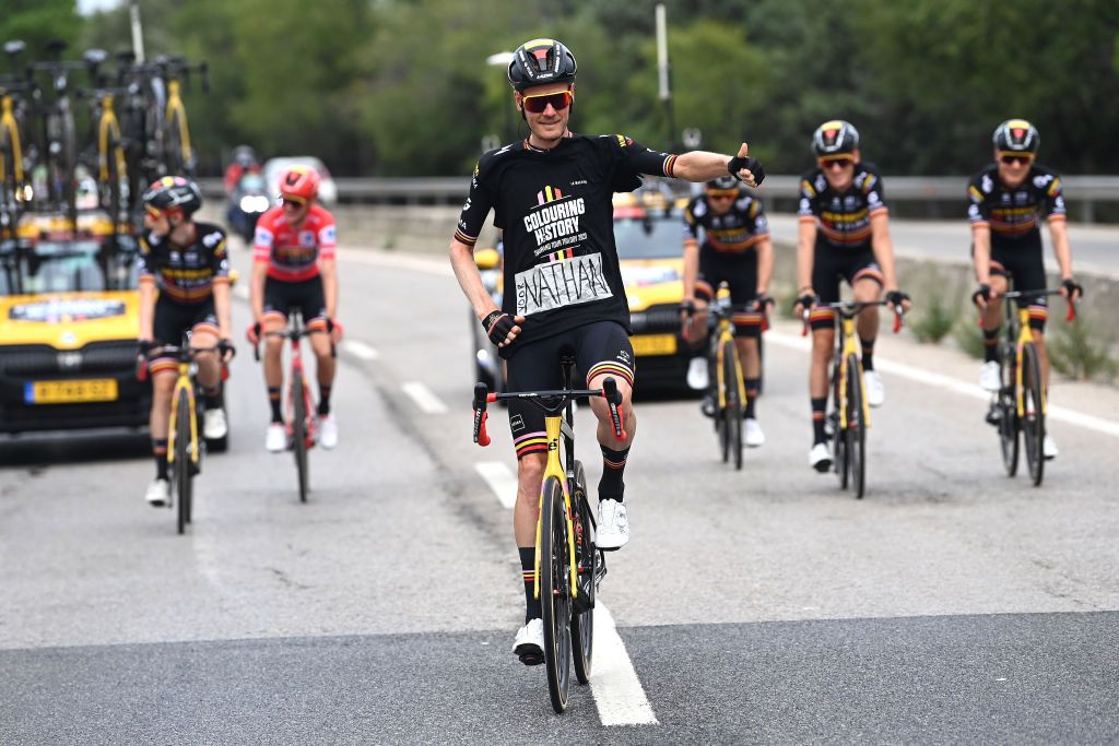 Dylan Van Baarle (Jumbo-Visma) sends encouragement and support to teammate Nathan Van Hooydonck