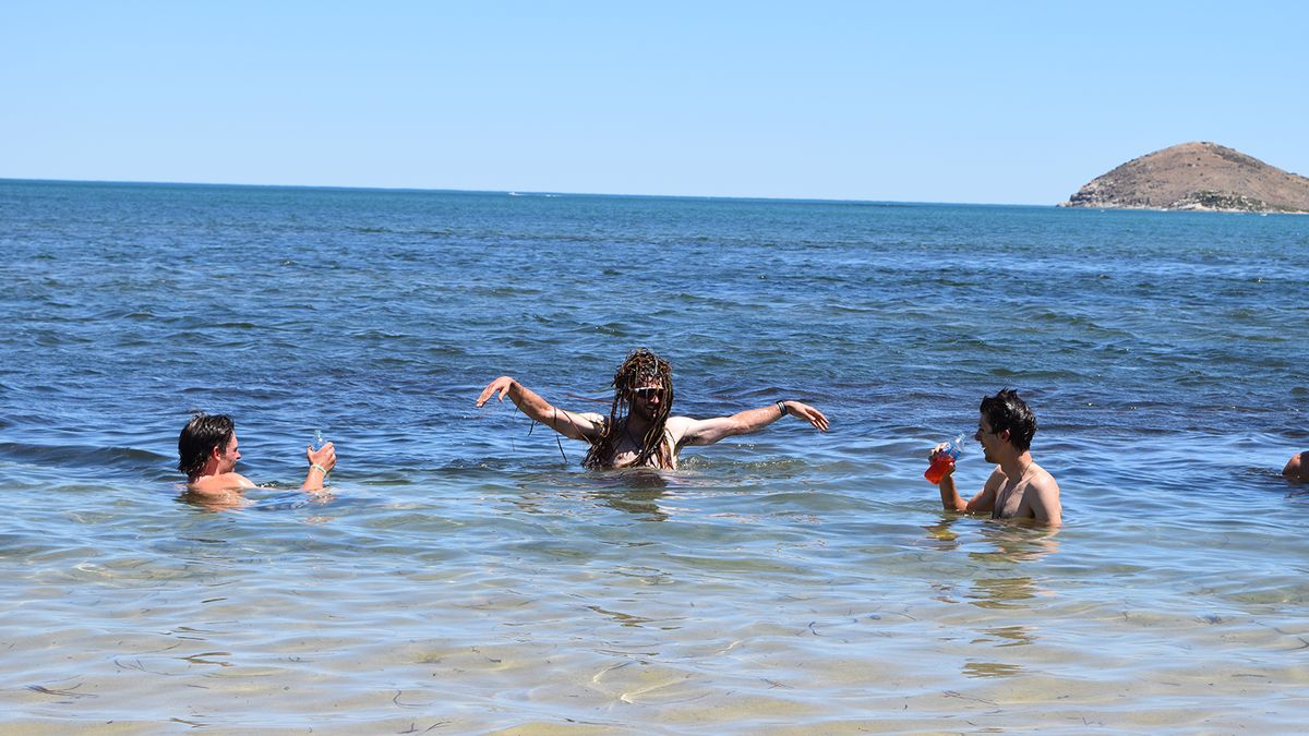 Nathan Haas pretends to be a mermaid
