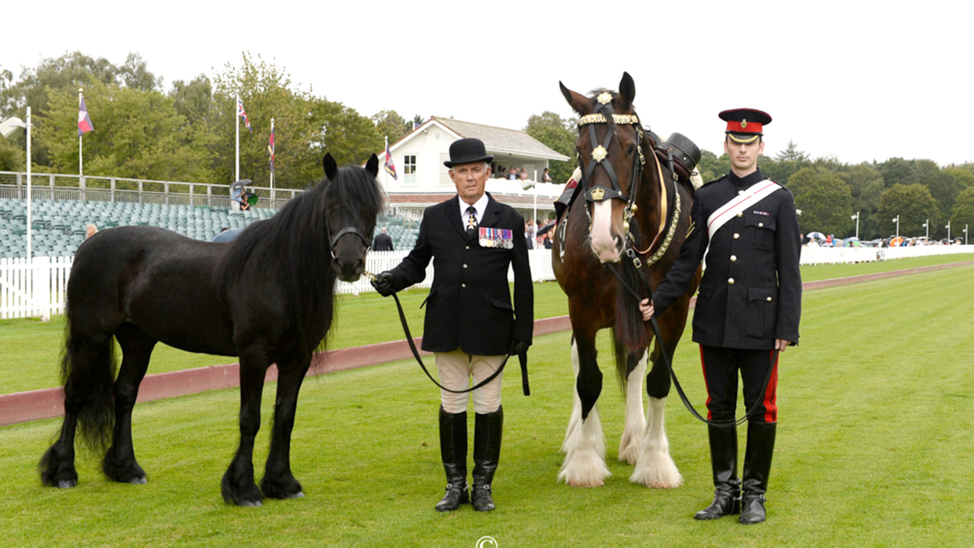 Emma with Juno the Household Cavalry Drum Horse on the Queen's Ground copyright Images of Polo web
