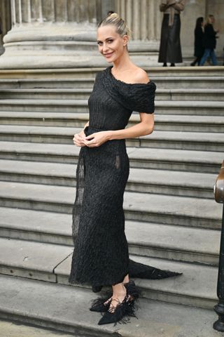 Poppy Delevingne attends the Erdem show