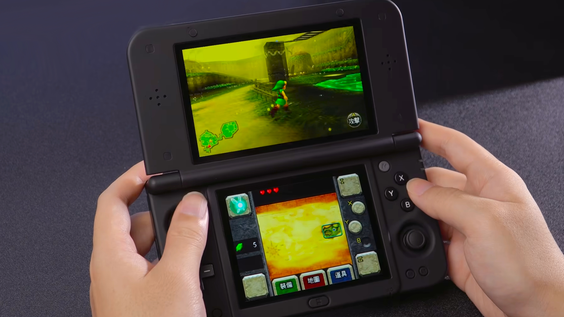 Anbernic RG DDS handheld in black running Zelda Ocarina of Time 3D.