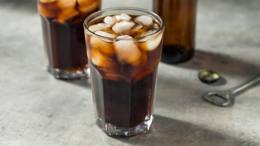 glasses of brown soda on a table