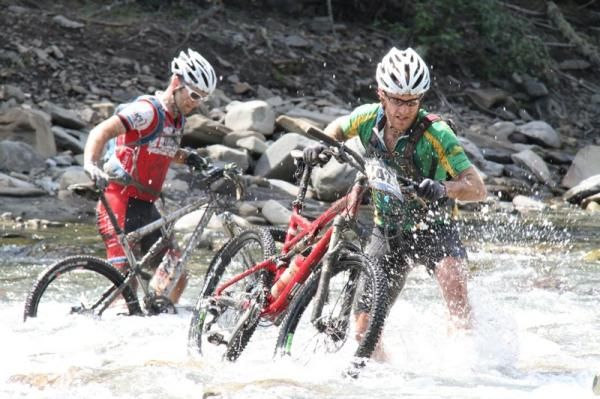 Mike Blennerhassett (f) and Mike Sarnecki find out how deep the water gets.