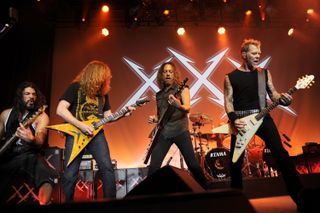 (from left) Robert Trujillo, Dave Mustaine, Kirk Hammett, and James Hetfield perform at Day Four of Metallica's 30th Anniversary shows at The Fillmore in San Francisco, California on December 10, 2011