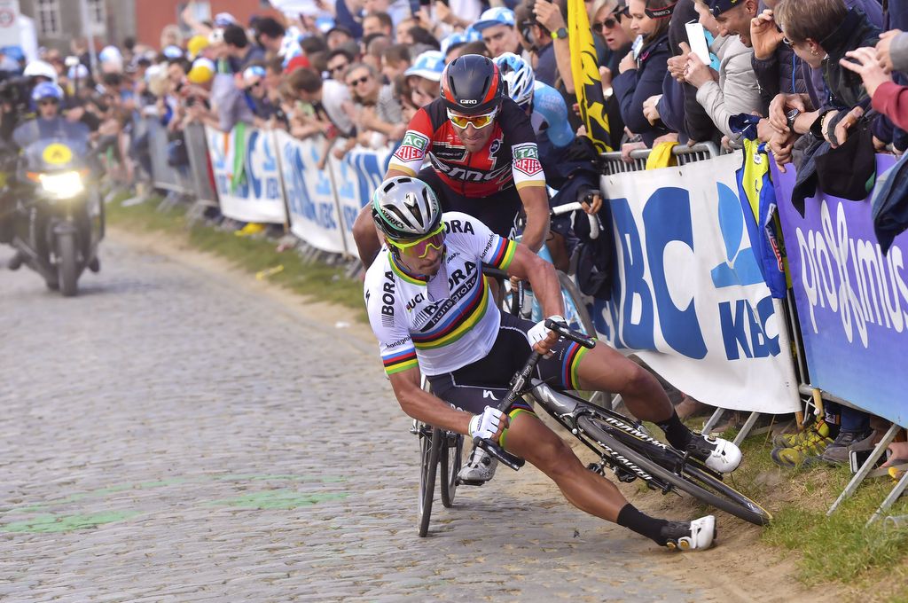 Sagan falls with Greg Van Avermaet realising he is also about to fall