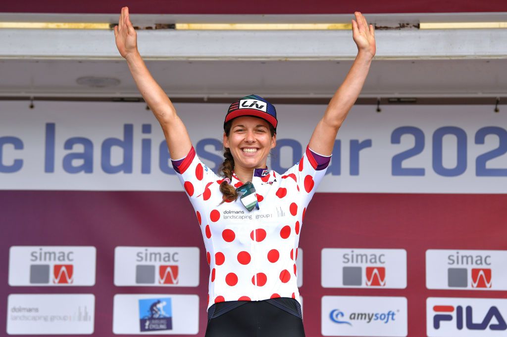 HARDENBERG NETHERLANDS AUGUST 25 Alison Jackson of Canada and Team Liv Racing celebrates winning the Polka Dot Mountain Jersey on the podium ceremony after the 23rd Simac Ladies Tour 2021 Stage 1 a 1344km stage from Zwolle to Hardenberg SLT2021 UCIWWT on August 25 2021 in Hardenberg Netherlands Photo by Luc ClaessenGetty Images