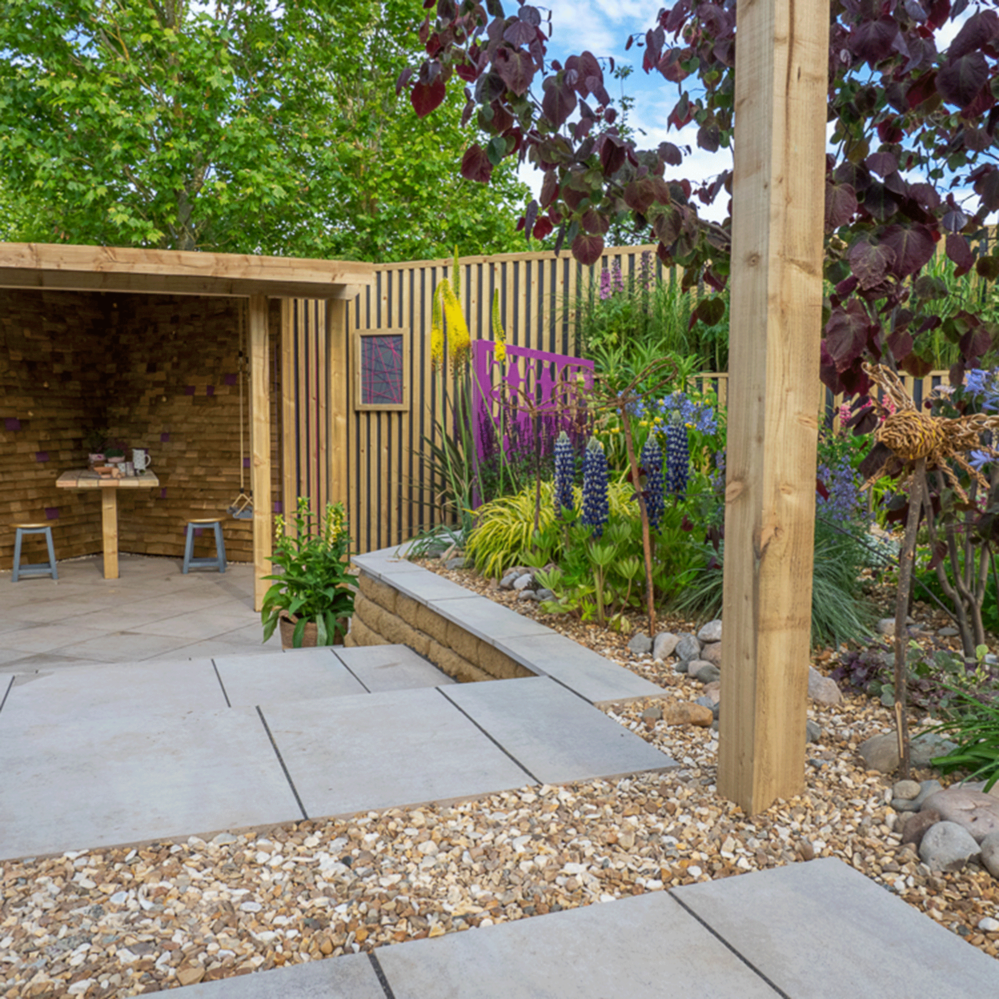 Drought tolerant planting with gravel and shelter