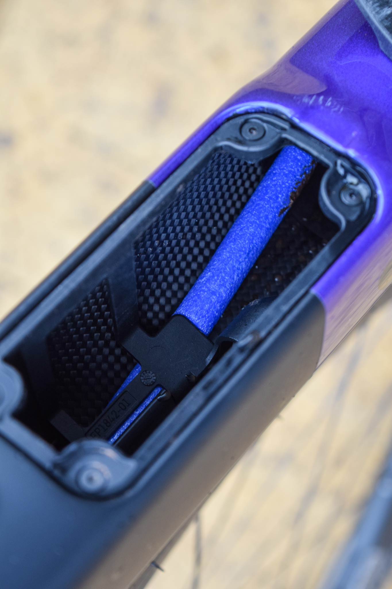 A frame downtube storage compartment 