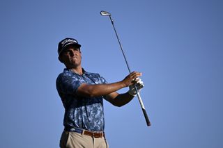 Emilio Gonzalez watches his wedge shot from distance