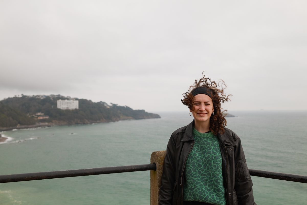 A photo of a woman smiling, taken on a Sigma BF camera