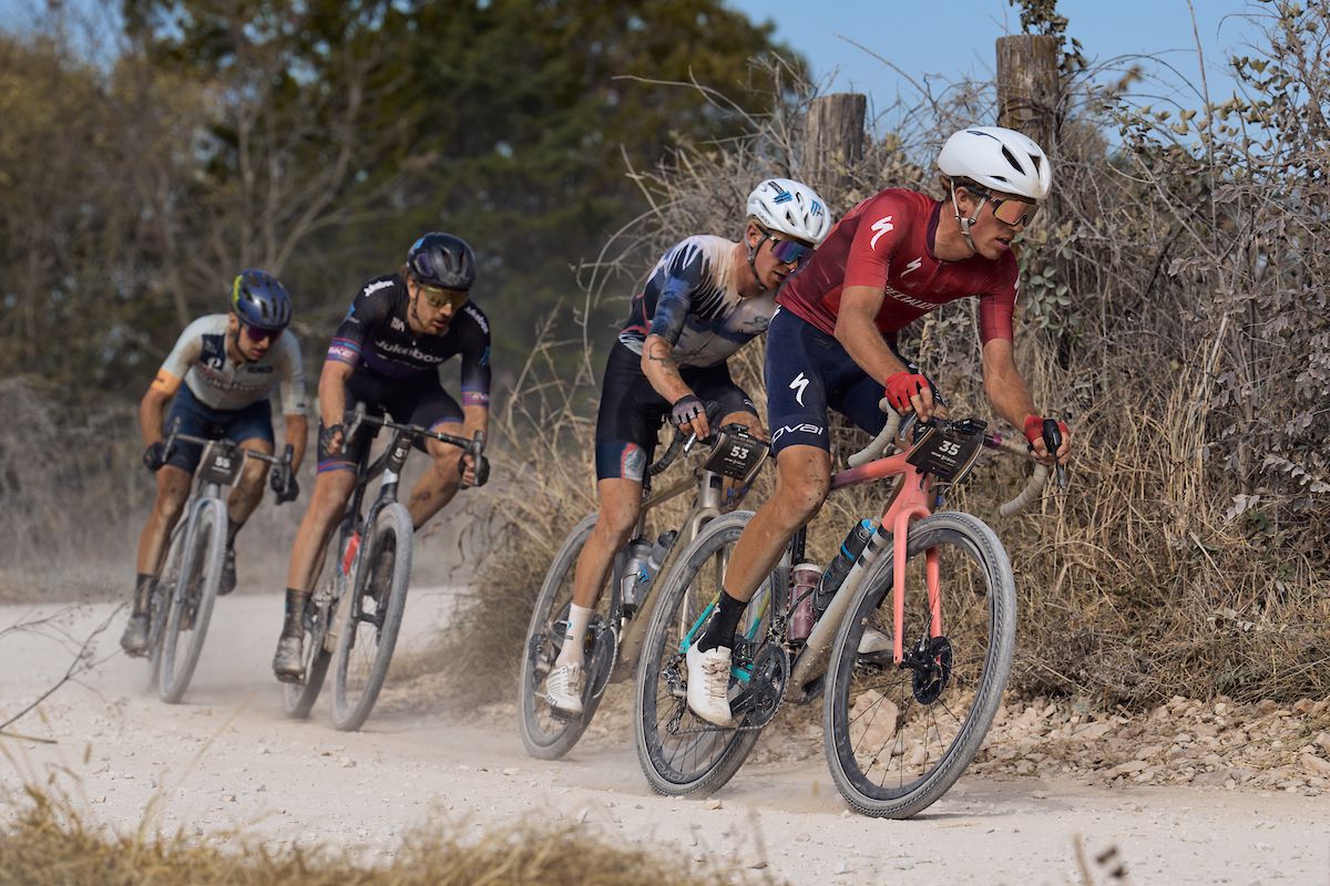 Selection of four riders battle for three spots on the pro men's podium at Big Sugar Gravel