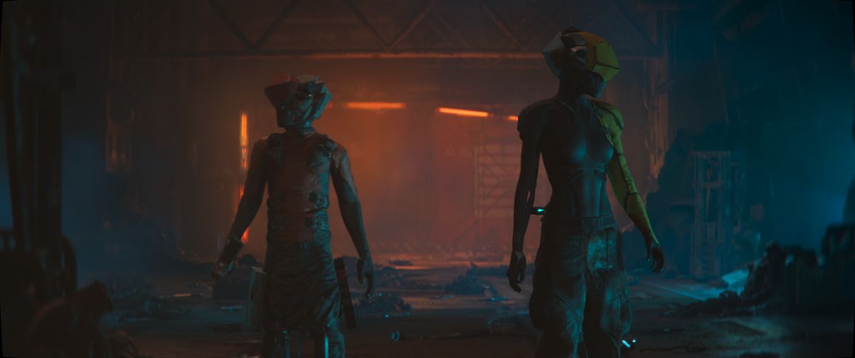 Babiru DaVinci Studio tips; Two figures, clad in futuristic, dark attire, walk through a dimly lit, industrial-style setting, bathed in warm, reddish-orange light.