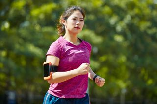 fitbit uses woman running