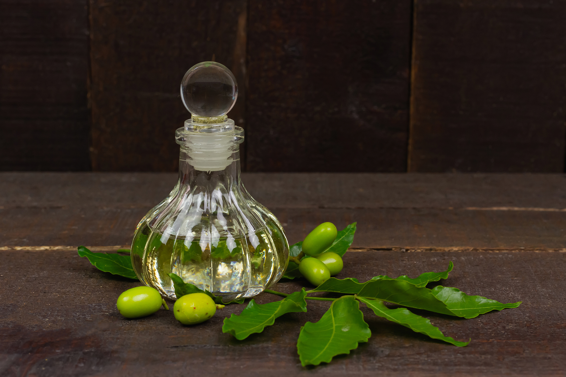 neem oil in vintage glass bottle