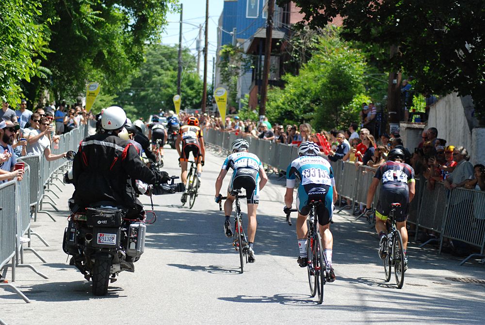 Connor McCutcheon and Chris Horner head up the wall