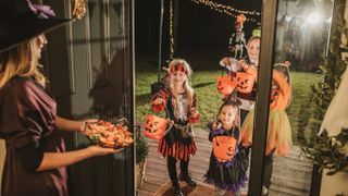 Kids trick or treating at Halloween.