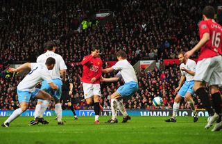 MANCHESTER, UNITED KINGDOM - MARCH 29: Cristiano Ronaldo of Man.Utd scores the opening goal with a back heel during the Barclays Premier League match between Manchester United and Aston Villa at Old Trafford on March 29, 2008 in Manchester, England. (Photo by Shaun Botterill/Getty Images)