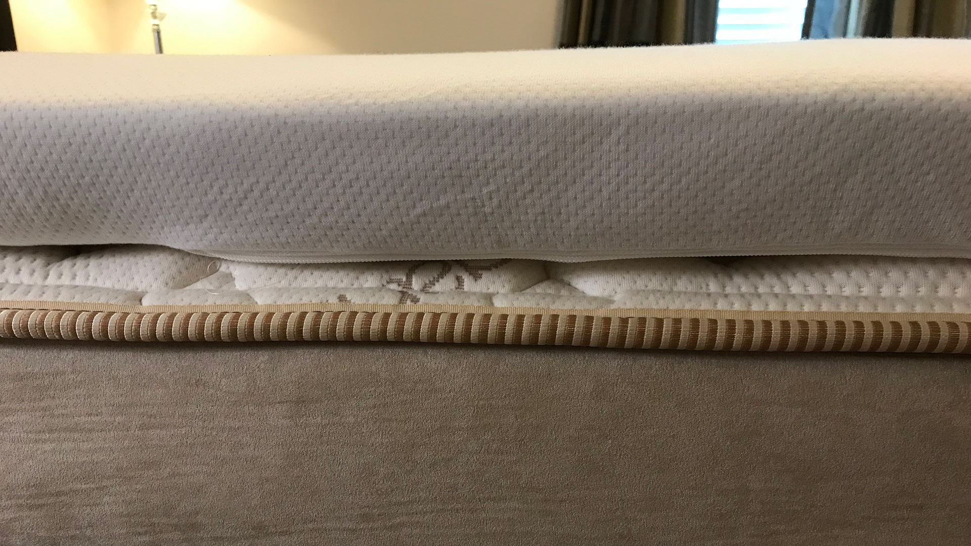 Close up of a Tempur-Pedic TEMPUR-Adapt Mattress Topper on a mattress