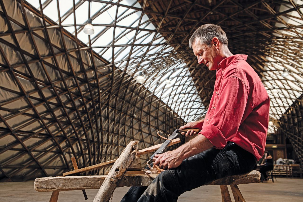 ‘Timber-frameologist’ Joe Thompson at work in the oak-lath Downland Gridshell at the Weald &amp;amp; Downland Museum in West Sussex.