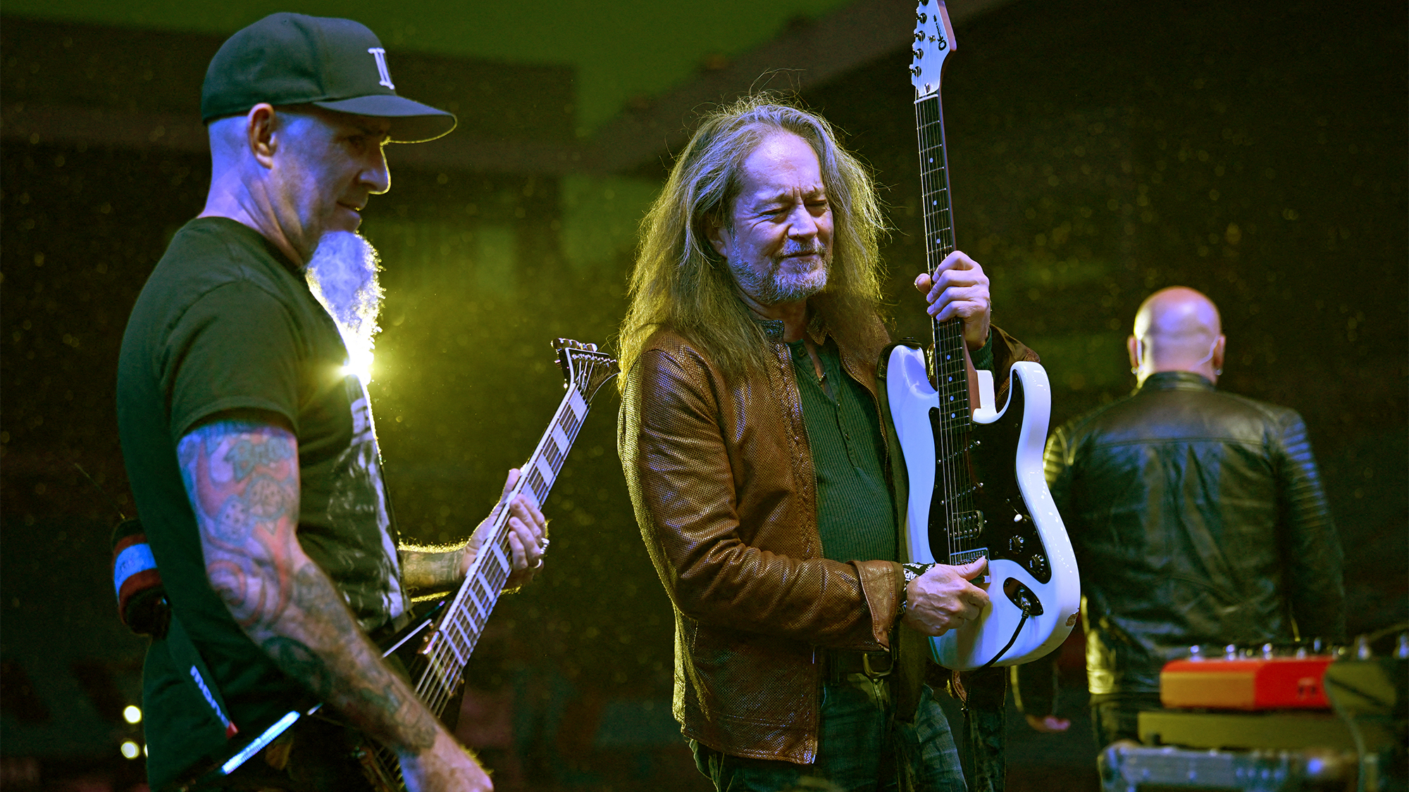 Member of US rock band Anthrax, Scott Ian (L) and former Ozzy Osbourne guitarist Jake E. Lee (R) during rehearsals on the eve of British rock band, Black Sabbath's "Back to the Beginning" concert, Ozzy Osbourne's final ever gig as Black Sabbath's frontman at Villa Park in Birmingham, central England on July 4, 2025. Osbourne, who revealed in 2020 that he has Parkinson's disease, will join Tony Iommi, Geezer Butler and Bill Ward for the all-day "Back To The Beginning" show in Birmingham, central England, where the heavy metal giants formed in 1968.
