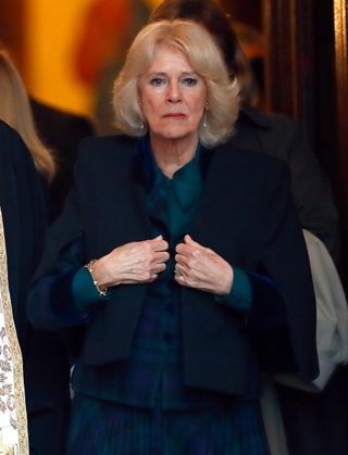 Queen Camilla looks tearful and sad